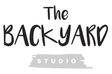 Logo of The Backyard Studio with a black and white design.
